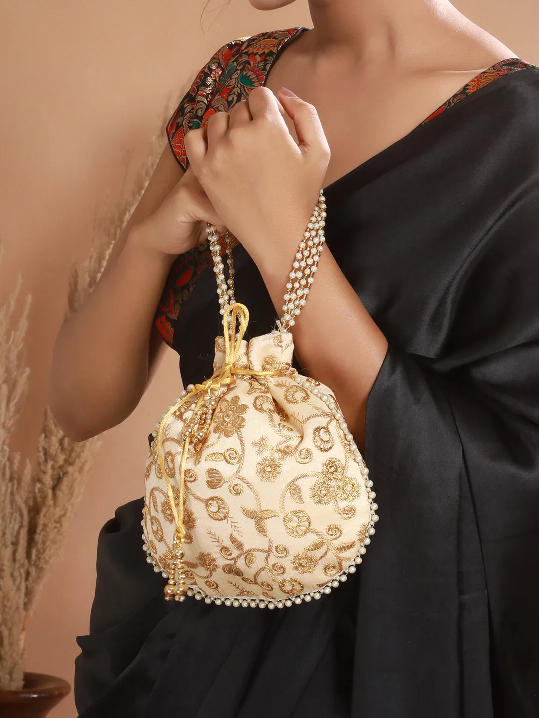Golden Classic Potli With Rich Embroidery Clutches